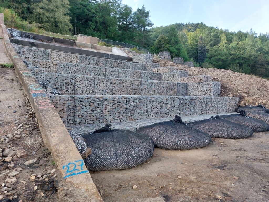 New headwall going in with gabions and rock bags going 